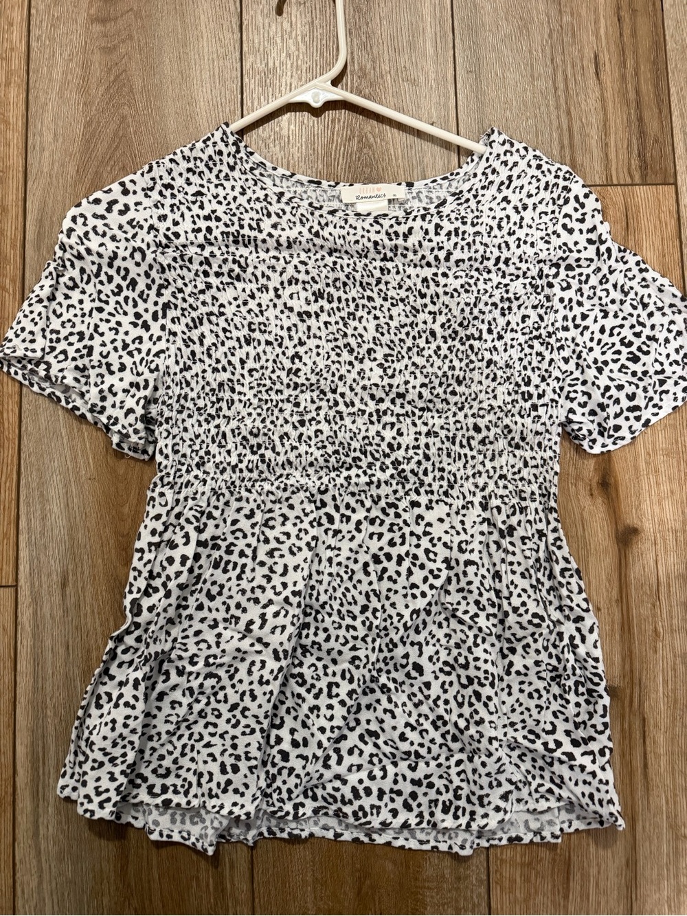 URBAN Romantics White and Black Leopard Smocked Peplum Short Sleeve Top